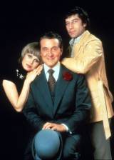 Chapeau melon et bottes de cuir