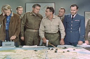 General Mark Grayson attempts to stop the monster - Reptilicus